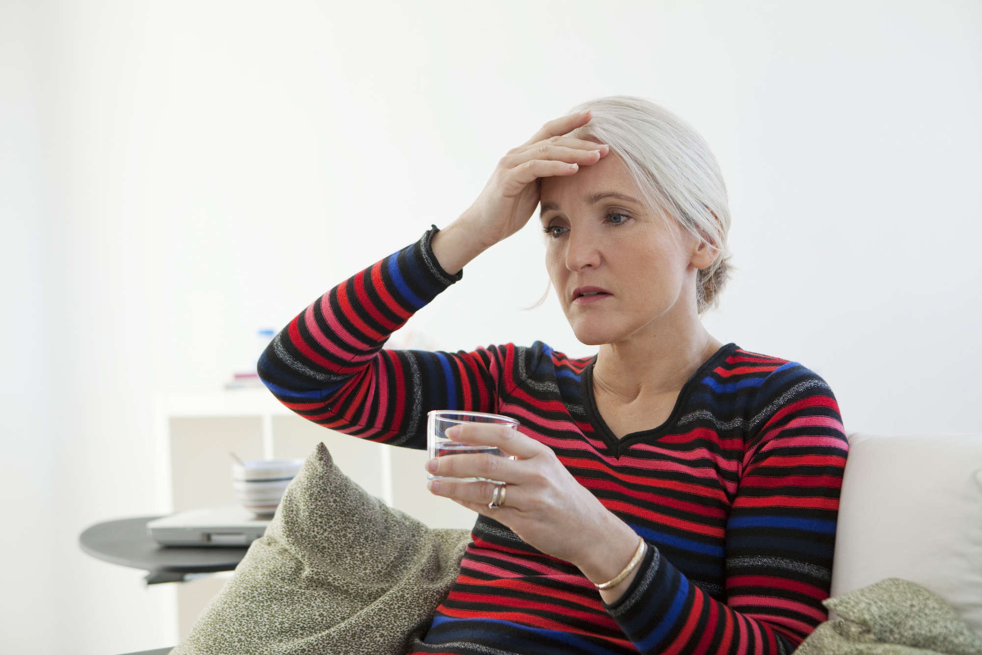 Woman experiencing menopause pains