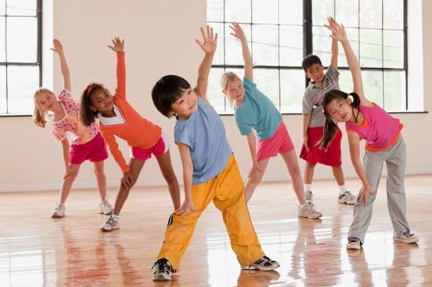 Children exercising fitness class